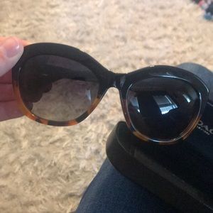 Brand new COACH sunglasses, case, and wipe.